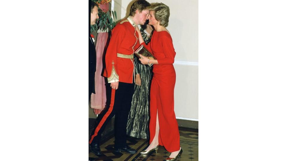 Charles Spencer kissing Princess Diana on the cheek