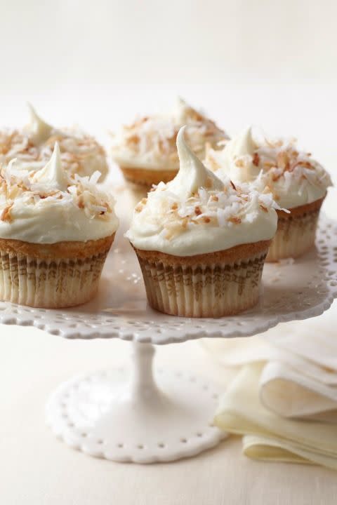 <p>The great thing about coconut is its versatility; it feels refreshing in warm weather and comforting in cold. This recipe makes the most of it, featuring a triple whammy of coconut in the batter—flakes, extract and milk—and a coconut cream cheese frosting.</p><p><strong><a href="https://www.womansday.com/food-recipes/food-drinks/recipes/a11194/coconut-cupcakes-coconut-white-chocolate-frosting-recipe-122600/" rel="nofollow noopener" target="_blank" data-ylk="slk:Get the recipe.;elm:context_link;itc:0;sec:content-canvas" class="link ">Get the recipe.</a></strong></p>