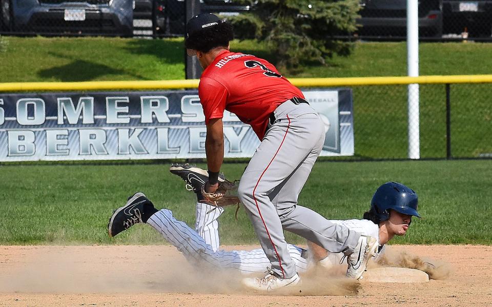 Somerset Berkley's Brady Cabral is safely back to second before the tag of Durfee's Jeyden Espinal.