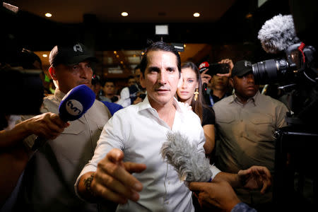 Presidential candidate Romulo Roux of the Democratic Change (CD) is surrounded by the media as they wait for the election results in Panama City, Panama May 5, 2019. REUTERS/Jose Cabezas