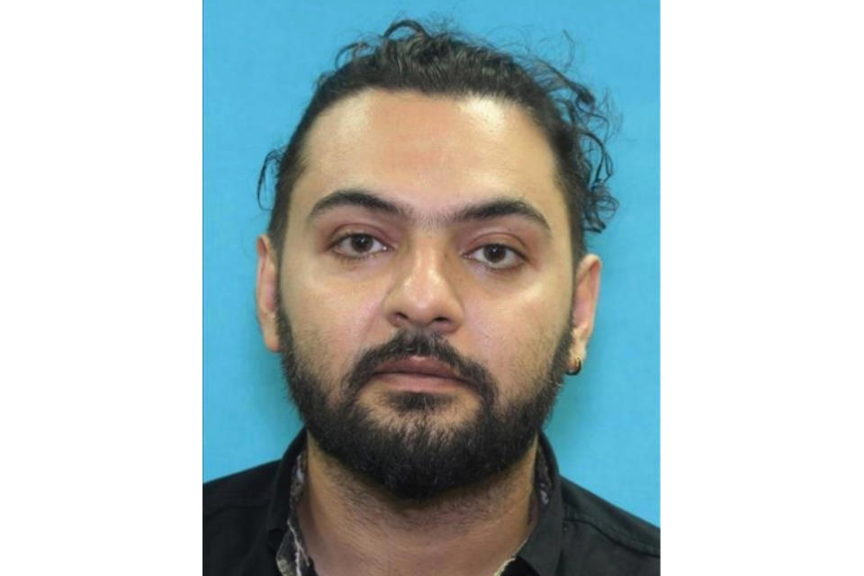 This undated photo released by the Redmond Police Department shows Ramin Khodakaramrezaei, 38. The longhaul truck driver from Texas who became obsessed with a software engineer after meeting her through a social media chatroom app killed her, her husband and himself in Redmond, Wash., after stalking them for months, police said. (Redmond Police Departemnet via AP)