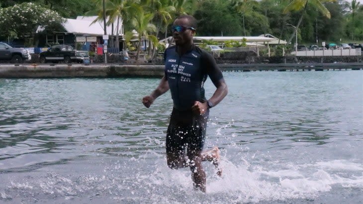 Sam Holness, a triathlete with autism, in Kona.