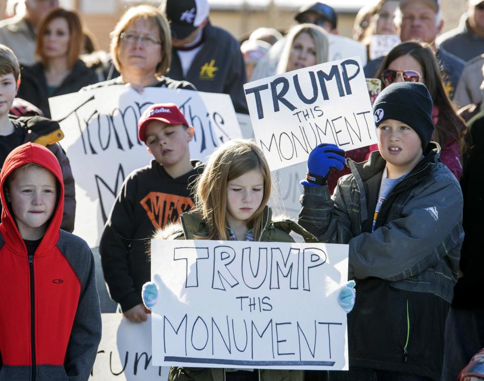 Protesters demonstrate against the new Bears Ear National Monument in Montecello, Utah, Thursday, Dec. 29, 2016. President Barack Obama expanded his environmental legacy in the final days of his presidency with national monument designations on lands in Utah and Nevada that have become flashpoints over use of public land in the U.S. West. The Bears Ears National Monument in Utah will cover over 1 million acres in the Four Corners region, the White House announced Wednesday. (Rick Egan/The Salt Lake Tribune via AP)