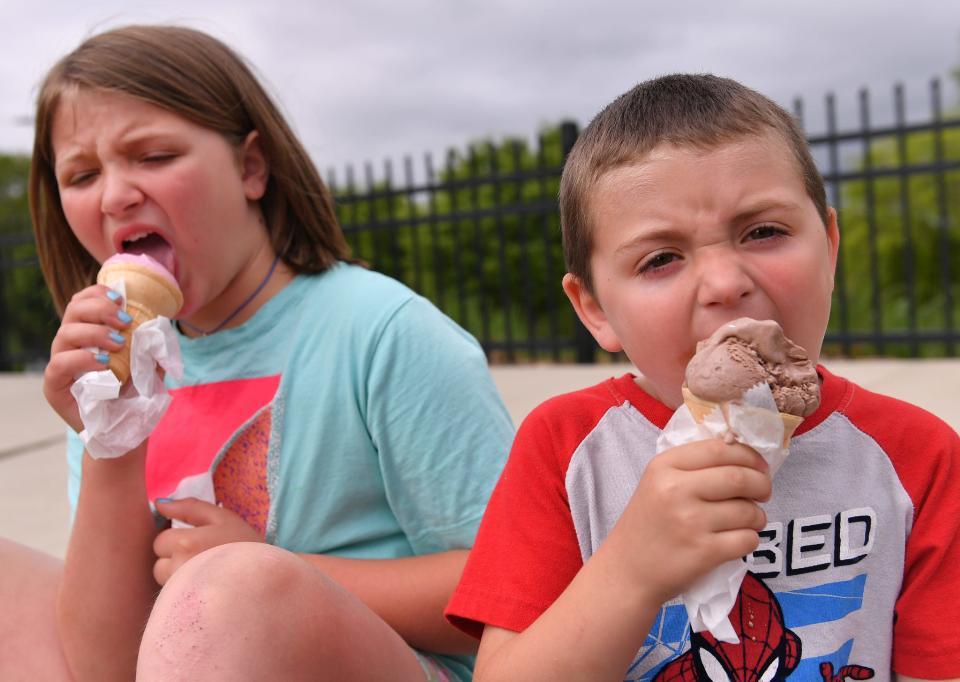 Aspen Street Treats is a food truck serving customers in Spartanburg County. Callie Cantrell, 8, and her brother Easton, 4, enjoy ice cream from the Aspen Sweet Treats truck.