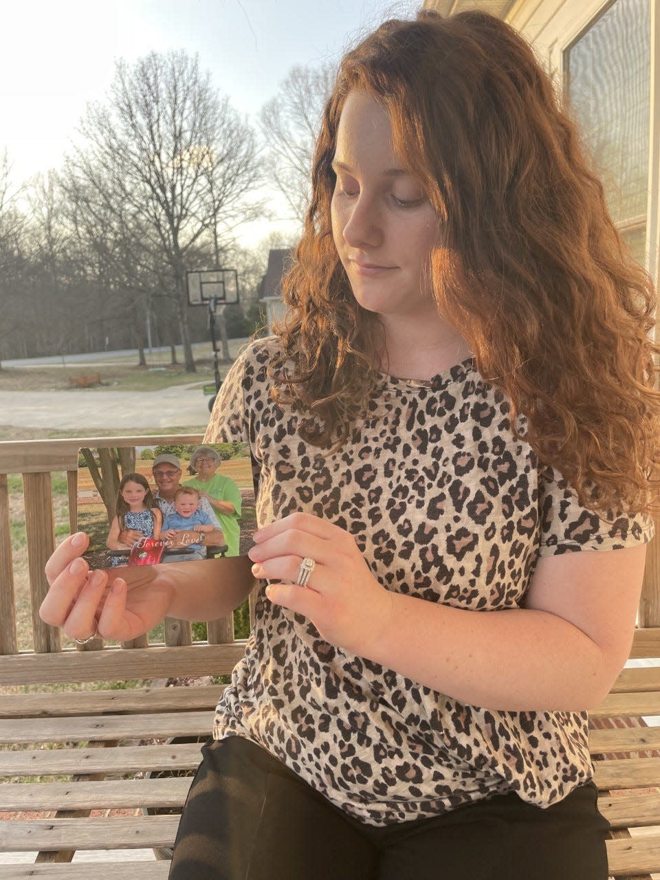 Shelby Crump holds a photo of her grandmother, Dot Hyde, who was killed in a hit and run in January.