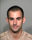 FILE - T undated photo provided by the Las Vegas Metropolitan Police Department shows officer Shay Mikalonis. A prosecutor said Friday, June 5, 2020, a 20-year-old Las Vegas man deliberately shot and gravely wounded Mikalonis during a Las Vegas Strip protest over the death of George Floyd, who died May 25 after being restrained by police in Minneapolis. A judge set bail at $1 million for suspect Edgar Samaniego on Friday, saying that police video that hasn't been made public shows the shooting. (Las Vegas Metropolitan Police Department via AP, File)