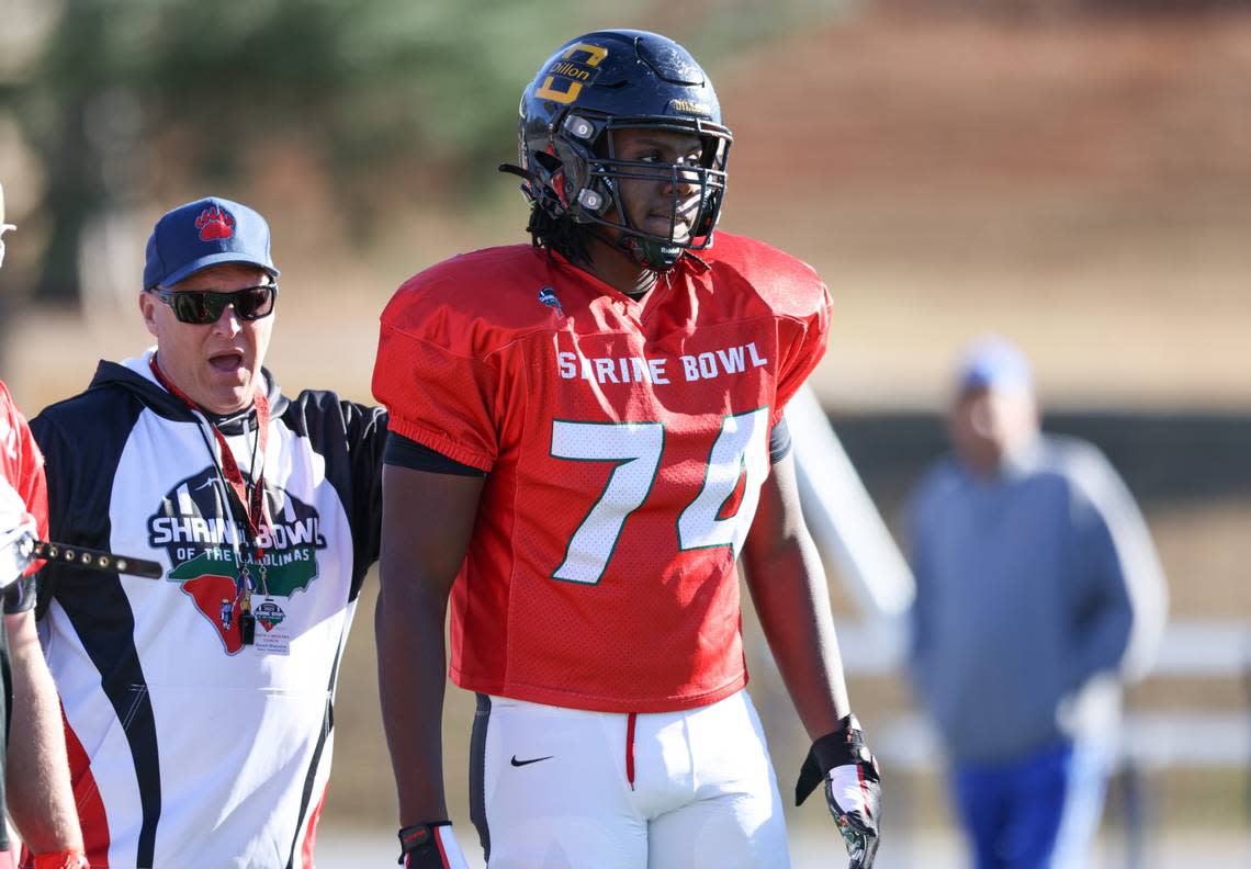 Josiah Thompson (74) listens to instructions during practice for the Shrine Bowl at McCracken Middle School in Spartanburg on Monday, Dec. 11, 2023. Sam Wolfe/Sam Wolfe/Special To The State