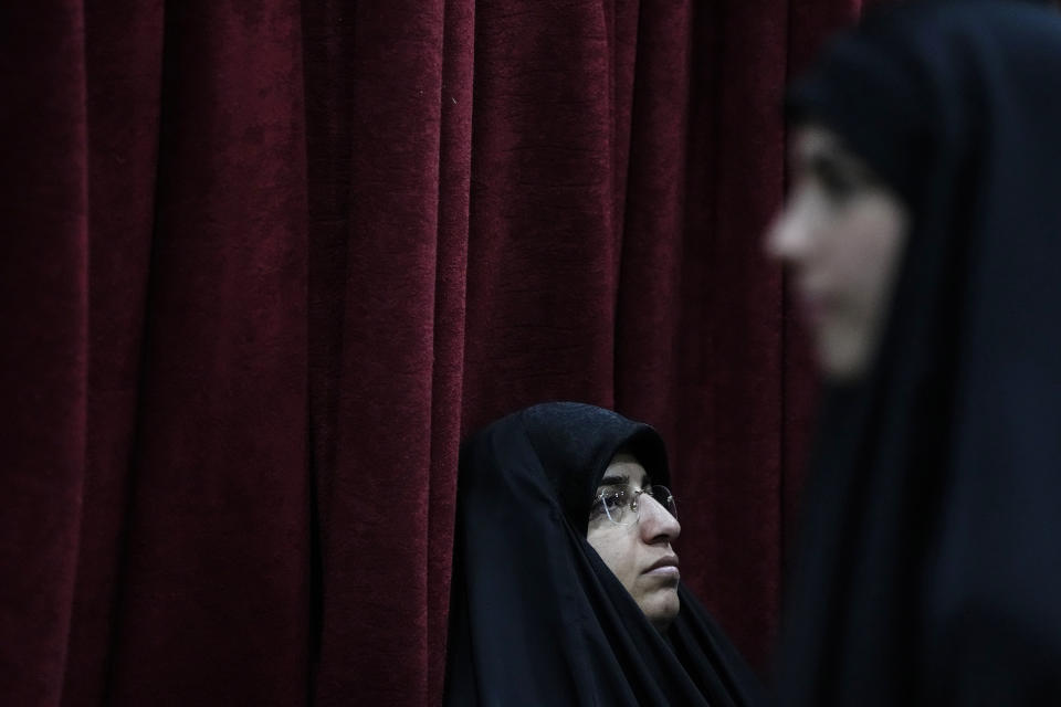 Supporters of the Iranian-backed Hezbollah group listen to a speech by Hezbollah leader Sayyed Hassan Nasrallah via a video link, during a ceremony marking the "Hezbollah Martyr Day," in the southern Beirut suburb of Dahiyeh, Lebanon, Saturday, Nov. 11, 2023. (AP Photo/Hassan Ammar)