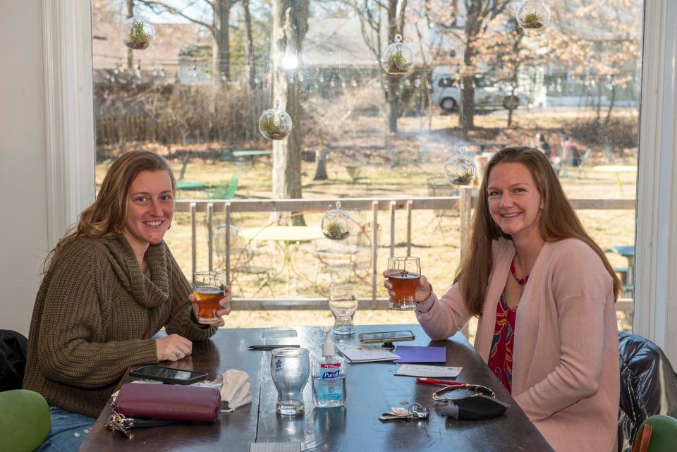 Megan Hessling of Hamilton, Ohio, and Carrie Chambers of Finneytown enjoy the Oberhausen from Fibonacci Brewing.