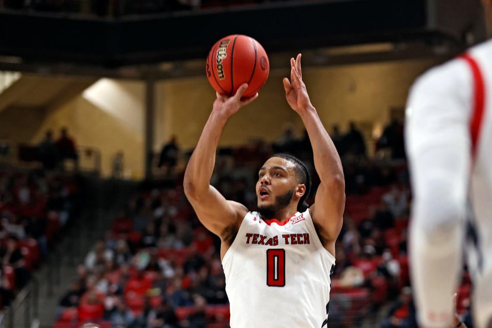 Texas Tech&#39;s Kevin Obanor (0) shoots the ball during the first half of an NCAA college basketball game on Saturday, Nov. 27, 2021, in Lubbock, Texas.