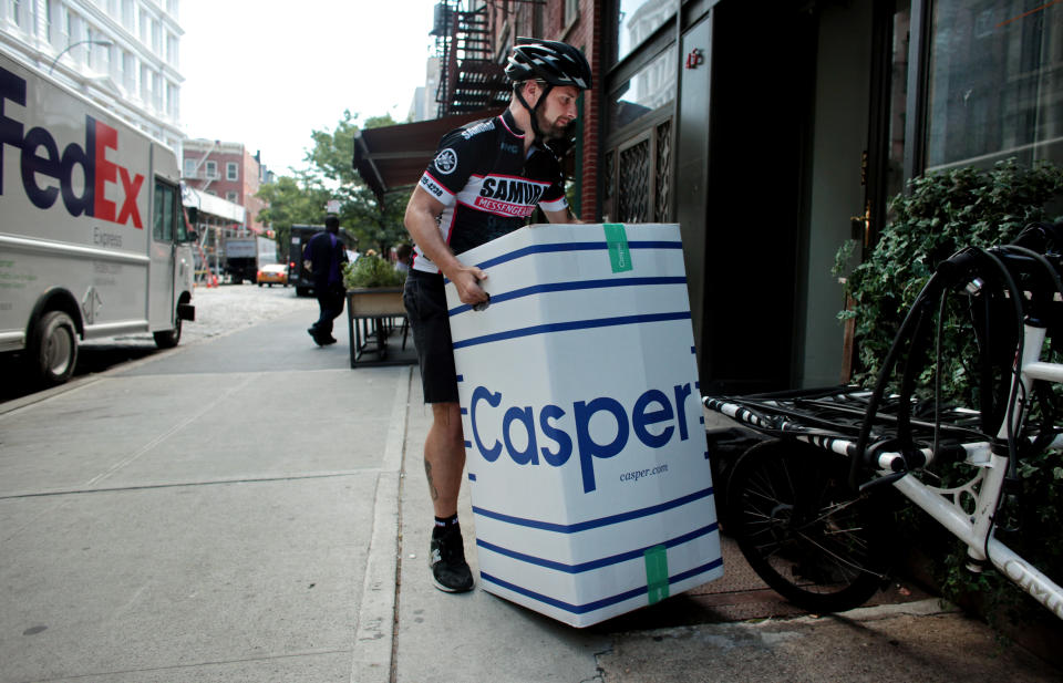 MANHATTAN, NY - AUGUST 28: Josh Weitzner, owner of Samurai Messenger Service, prepares to deliver a packaged mattress from the bed delivery company Casper in Manhattan, NY, on August 28, 2015. (Photo by Yana Paskova/For The Washington Post via Getty Images)