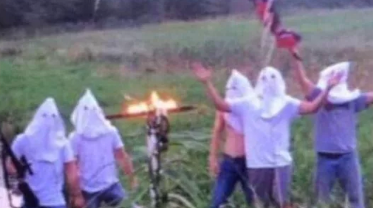 A group of high school students have caused a firestorm in a small Iowa town for this image posted on social media. (AP)