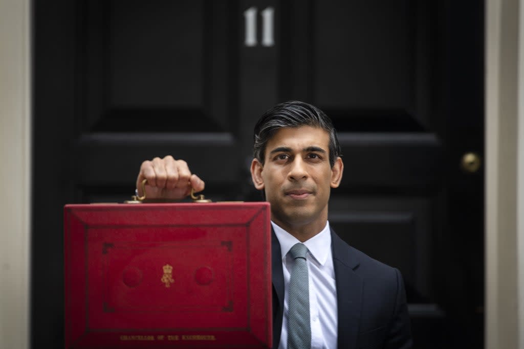 Chancellor of the Exchequer, Rishi Sunak outside 11 Downing Street, London, before heading to the House of Commons to deliver his Budget earlier this year (Victoria Jones/PA) (PA Archive)