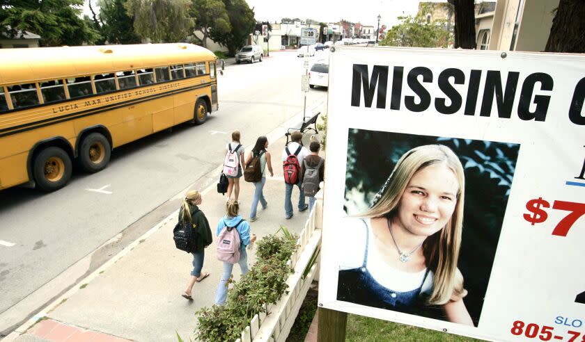 111147.ME.Smart.DOK (Torrance) - - Just across the East Branch Street, from city hall, in the California central coast town of Arroyo Grande, is this sign that helps with public awareness in case involving MISSING Cal Poly San Luis Obispo student Kristin Smart. Kristen was in her first year at Cal Poly when she vanished in 1996. Smart was declared legally dead in 2002, despite the fact that her body has never been recovered. The sign is on property belonging to the attorney for the Smart family. PHOTOGRAPHED THURSDAY MAY 18, 2006