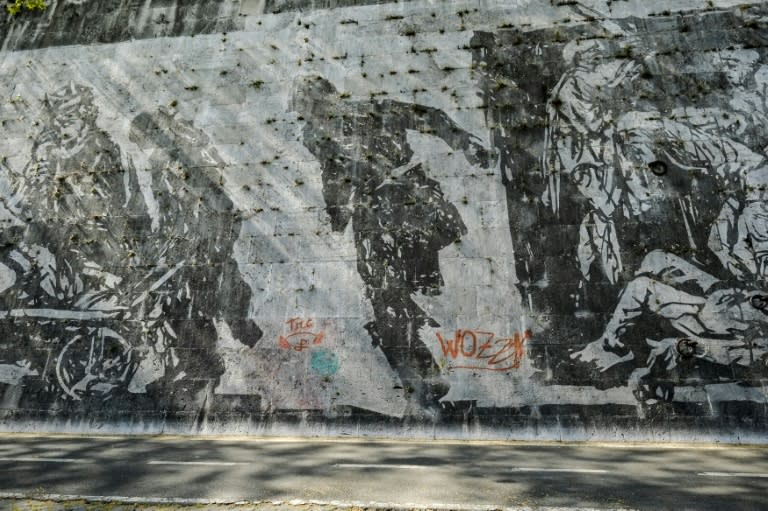 Graffiti was scrawled on the "Triumphs and Laments" fresco which was completed along the banks of Rome’s Tiber river less than a year ago by South African artist William Kentridge