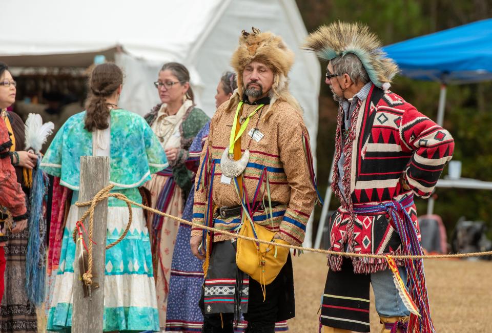 Dancers get ready to show off their skills to the crowd during the Santa Rosa Band of the Lower Muskogee 32nd annual Creek Festival at their tribal grounds in Milton Sunday, November 20, 2022.