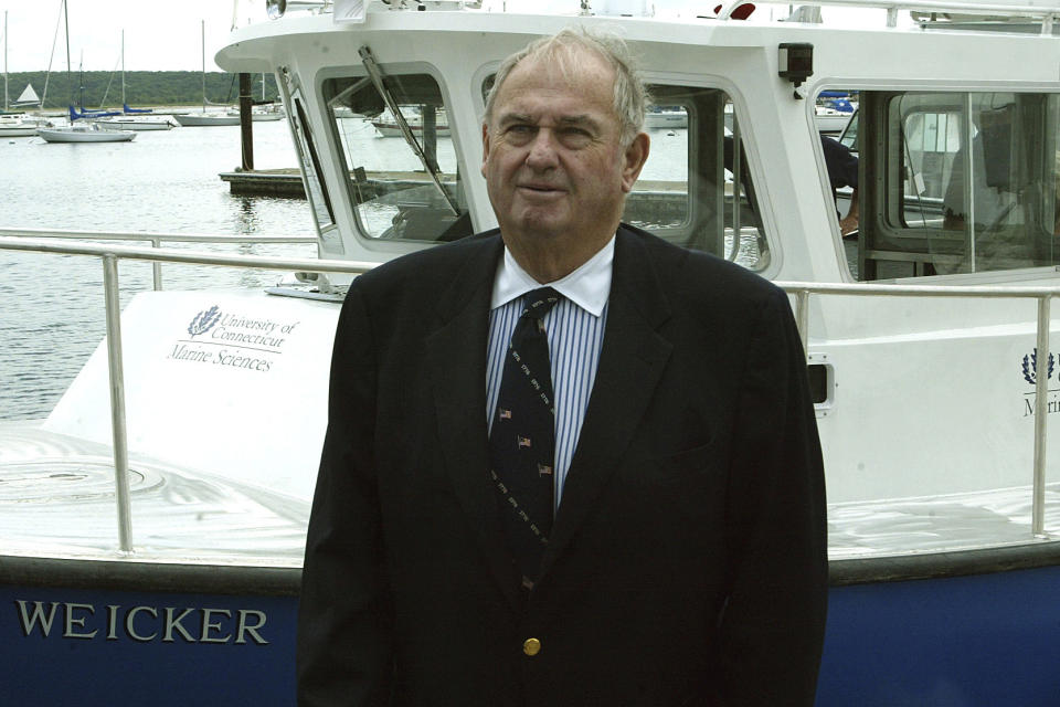FILE - Former Connecticut Gov. Lowell P. Weicker Jr. stands by the new research vessel R/V Lowell Weicker during commissioning of the vessel at the University of Connecticut's Avery Point campus in Groton, Conn., Thursday, June 15, 2006. Weicker Jr., a Republican U.S. senator who tussled with his own party during the Watergate hearings, championed legislation to protect people with disabilities and later was elected Connecticut governor as an independent, died Wednesday, June 28, 2023. He was 92. (AP Photo/Bob Child)