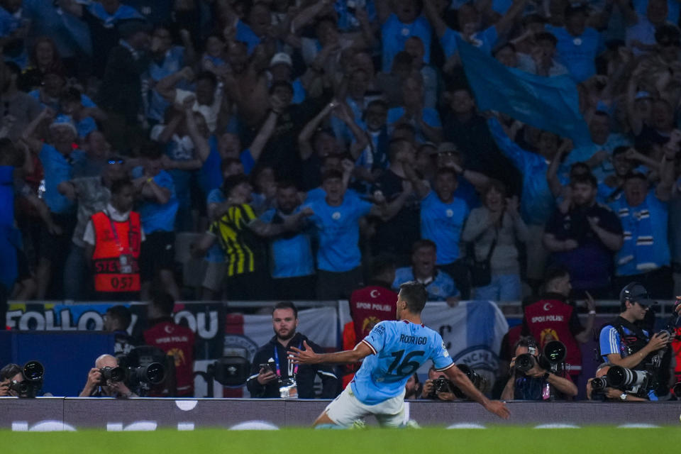 Manchester City's Rodrigo celebrates after scoring his side's opening goal during the Champions League final soccer match between Manchester City and Inter Milan at the Ataturk Olympic Stadium in Istanbul, Turkey, Saturday, June 10, 2023. (AP Photo/Manu Fernandez)