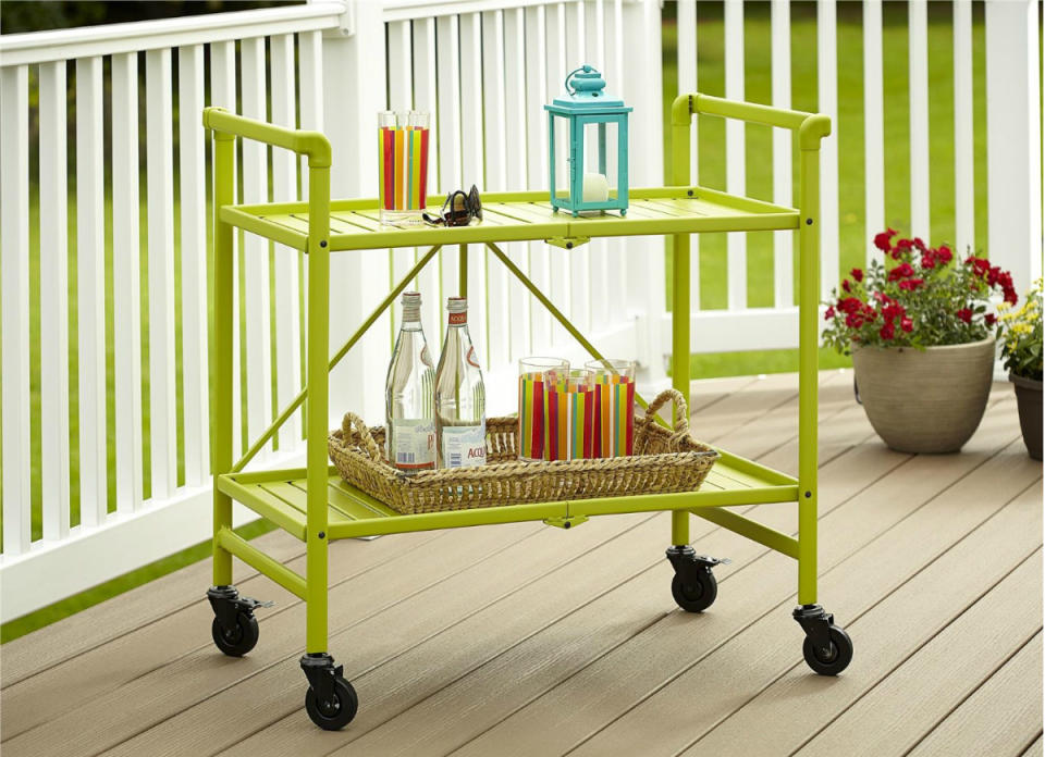 <body> <p>Nothing says comfort quite like a bar cart that keeps refreshments—adult or otherwise—always within reach. Energize your outdoor space with a wheeled <a rel="nofollow noopener" href=" http://amzn.to/1TFd7iM" target="_blank" data-ylk="slk:serving cart like the one shown here;elm:context_link;itc:0;sec:content-canvas" class="link ">serving cart like the one shown here</a>, all decked out in a punchy hue and stocked with chilled beverages. You can fold it up for storage between seasons, or roll it right indoors to add style and storage to any room. <em>Available on <a rel="nofollow noopener" href=" http://amzn.to/1TFd7iM" target="_blank" data-ylk="slk:Amazon;elm:context_link;itc:0;sec:content-canvas" class="link ">Amazon</a>; $52.</em> </p> <p><strong>Related: <a rel="nofollow noopener" href=" http://www.bobvila.com/slideshow/17-diy-mini-bars-to-mix-up-your-home-decor-47255#.V0NhEZPyuRs?bv=yahoo" target="_blank" data-ylk="slk:17 DIY Mini Bars to Mix Up Your Home Decor;elm:context_link;itc:0;sec:content-canvas" class="link ">17 DIY Mini Bars to Mix Up Your Home Decor</a> </strong> </p> </body>