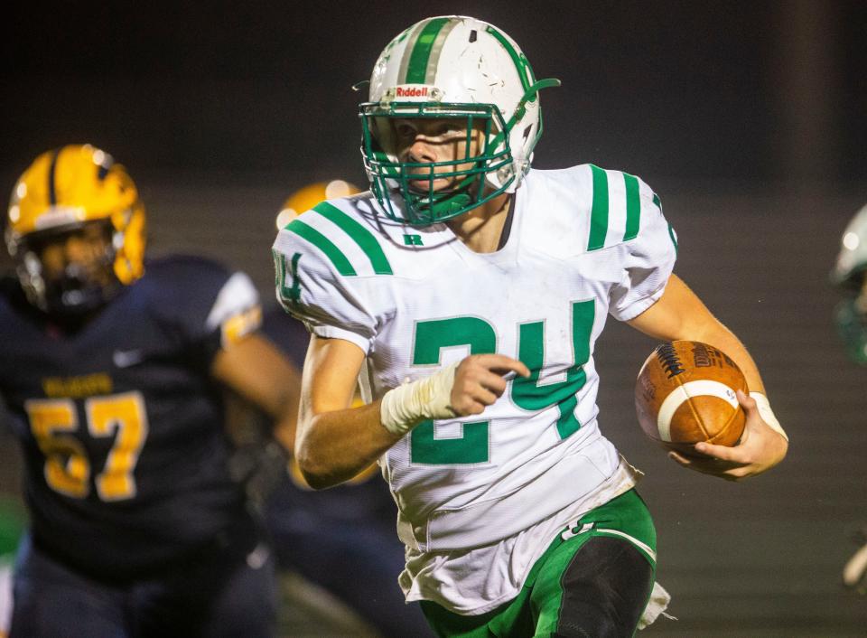 Bremen's Lance Moser runs the ball during the Riley vs. Bremen High School football game Friday, Oct. 8, 2021 at Jackson Field in South Bend. 