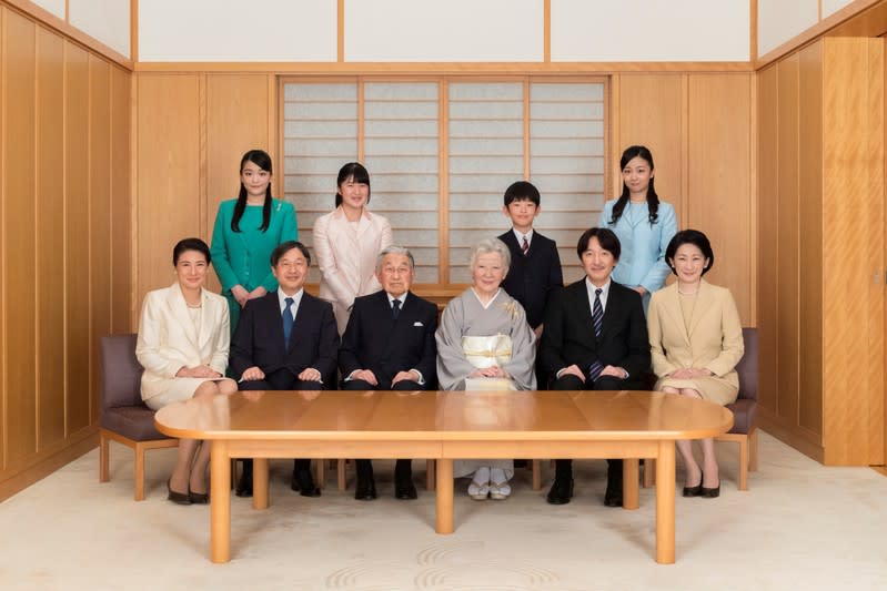 FILE PHOTO: Japanese Emperor Akihito and Empress Michiko with their family members during a family photo session for the New Year at the Imperial Palace in Tokyo