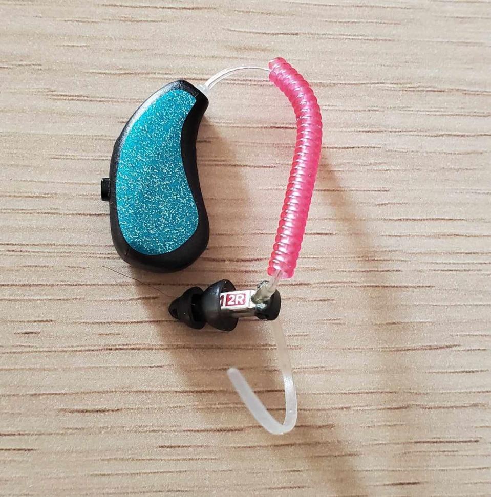 Katie Horne bedazzled her hearing aid. When she first began using hearing aids, Katie noticed things she had forgotten about, like the noises coming from the highway by her home. (Image provided by Katie Horne) 
