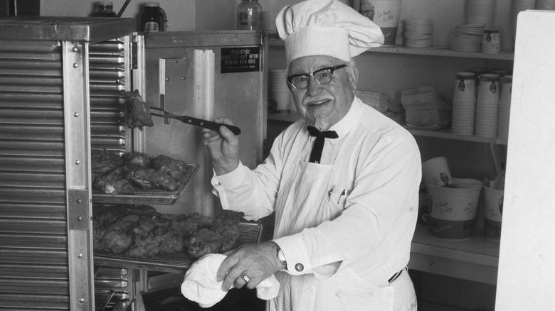 Colonel Sanders cooking chicken