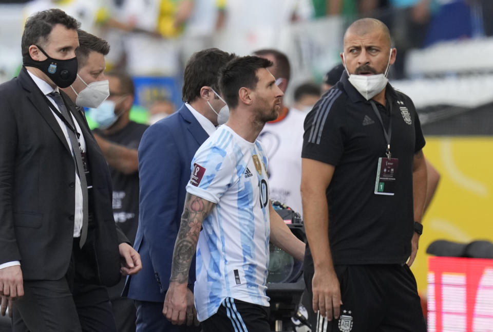 Argentina's Lionel Messi walks off the field after the qualifying soccer match for the FIFA World Cup Qatar 2022 against Brazil was interrupted by health officials in Sao Paulo, Brazil, Sunday, Sept.5, 2021. (AP Photo/Andre Penner)