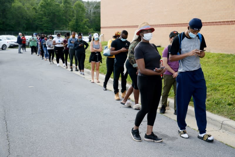 Voters go to the polls to vote in U.S. presidential primary election in College Park, Maryland