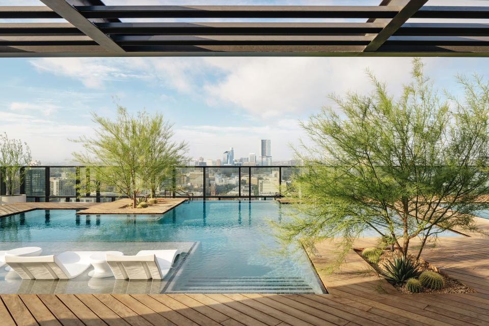 The rooftop pool at Waterloo, a 30-story tower in Austin's West Campus, looks out over the city's skyline.