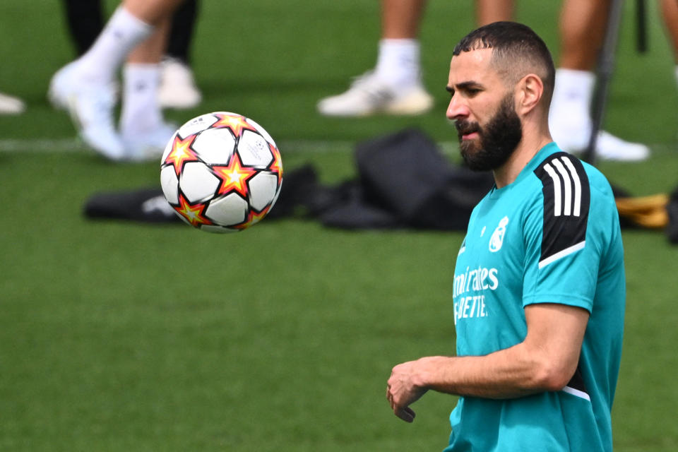 Real Madrid's French forward Karim Benzema attends a training session at the Ciudad Real Madrid in the Madrid's suburb of Valdebebas during the club's Media Day on May 24, 2022 ahead of their UEFA Champions League final match against Liverpool. (Photo by GABRIEL BOUYS / AFP) (Photo by GABRIEL BOUYS/AFP via Getty Images)