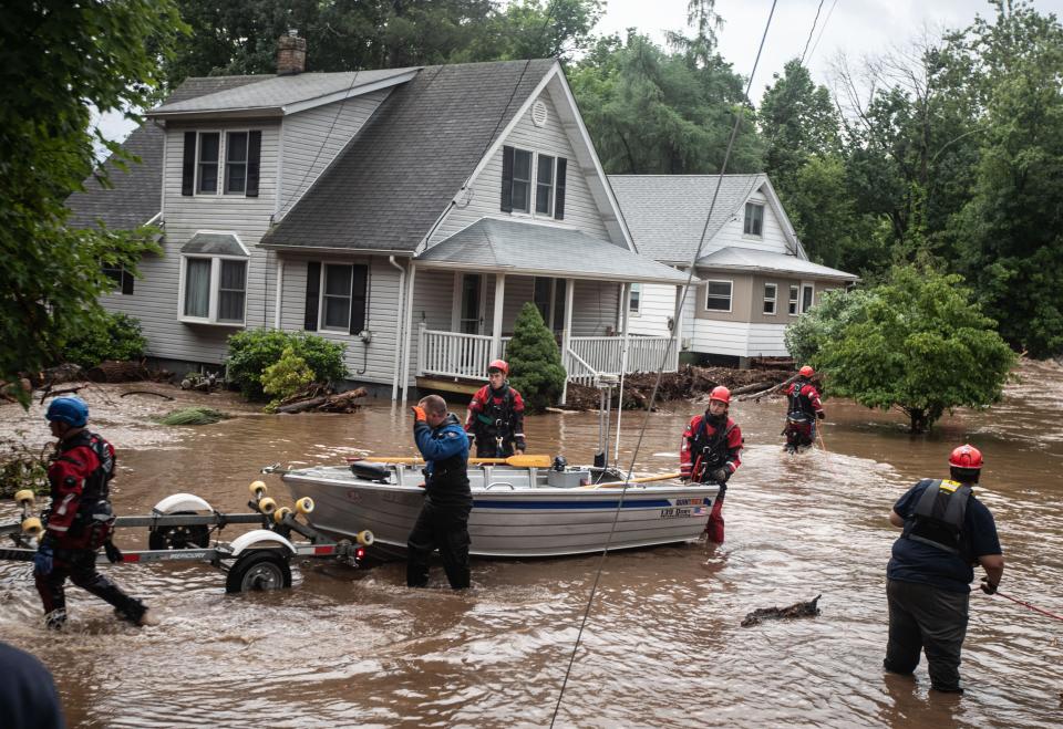 Emergency personnel used a boat to rescue residents of flooded homes on Lowland Hill Rd. in Stony Point July 9, 2023. Torrential rain led to flash flooding throughout the Lower Hudson Valley, causing road closures in Rockland, Putnam, and northern Westchester County.