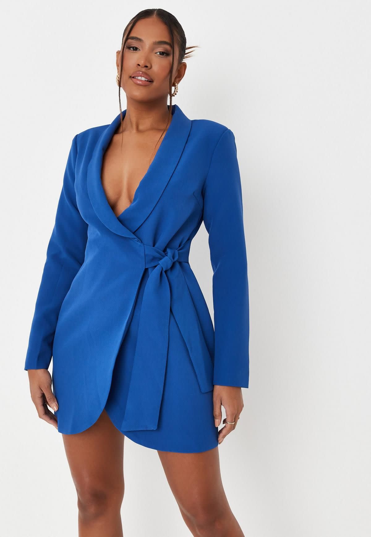 <p><a href="https://go.redirectingat.com?id=74968X1596630&url=https%3A%2F%2Fwww.missguidedus.com%2Fblue-wrap-tie-side-blazer-mini-dress-10276703&sref=https%3A%2F%2Fwww.cosmopolitan.com%2Fstyle-beauty%2Ffashion%2Fg27546574%2Fsummer-work-office-outfits%2F" rel="nofollow noopener" target="_blank" data-ylk="slk:Shop Now;elm:context_link;itc:0;sec:content-canvas" class="link rapid-noclick-resp">Shop Now</a></p><p>Blazer Mini Dress</p><p>$35.00</p><p>Missguided</p>