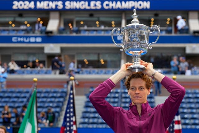 Jannik Sinner poses with the US Open trophy