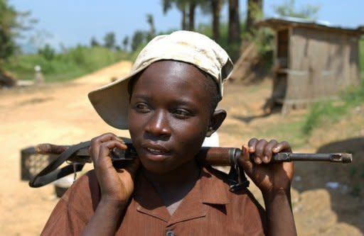 Picture from 2003 of Isembo, who claimed to be have been a rebel fighter in DR Congo since he was 12. The International Criminal Court jailed Congolese warlord Thomas Lubanga for 14 years Tuesday for using child soldiers in his rebel army, the first sentence to be handed down by the world's only permanent war crimes tribunal