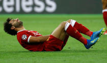 Soccer Football - Champions League Final - Real Madrid v Liverpool - NSC Olympic Stadium, Kiev, Ukraine - May 26, 2018 Liverpool's Mohamed Salah reacts after sustaining an injury REUTERS/Kai Pfaffenbach