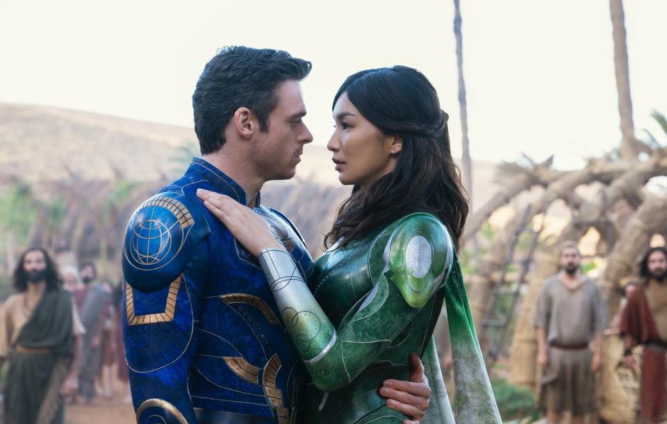 Richard Madden and Gemma Chan's characters embracing in Eternals