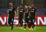 Football Soccer - Bayer Leverkusen v Atletico Madrid - UEFA Champions League Round of 16 First Leg - BayArena, Leverkusen, Germany - 21/2/17 Bayer Leverkusen's Aleksander Dragovic, Leon Bailey, Charles Arangui and Wendell look dejected after the match Reuters / Wolfgang Rattay Livepic