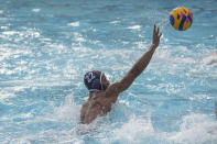 U.S. Olympic Water Polo Team attacker Max Irving trains for the Paris Olympics, at Mt. San Antonio College in Walnut, Calif., on Wednesday, Jan. 17, 2024. Irving's father, Michael Irving, is a Pac-12 college basketball referee. Max Irving is also the only Black man on the U.S. Olympic Water Polo Team and a prominent advocate for diversity in the sport. (AP Photo/Damian Dovarganes)