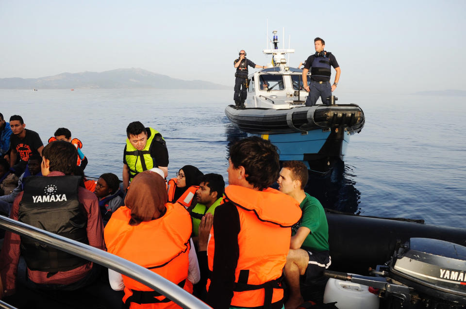 A Swedish coast guard boat pulls up in case additional assistance was needed.