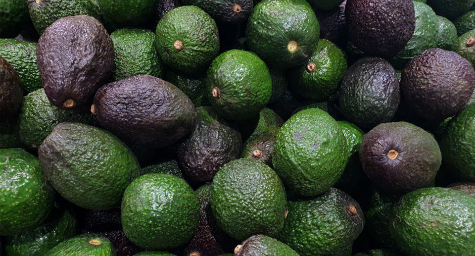 A pile of avocados