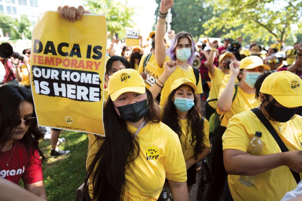 FILE - Susana Lujano, left, a dreamer from Mexico who lives in Houston, joins other activists to rally in support of the Deferred Action for Childhood Arrivals program, also known as DACA, at the Capitol in Washington, Wednesday, June 15, 2022. A federal judge on Wednesday, Sept. 13, 2023, declared illegal a revised version of a federal policy that prevents the deportation of hundreds of thousands of immigrants brought to the U.S. as children. (AP Photo/J. Scott Applewhite, File) ORG XMIT: NYWS308