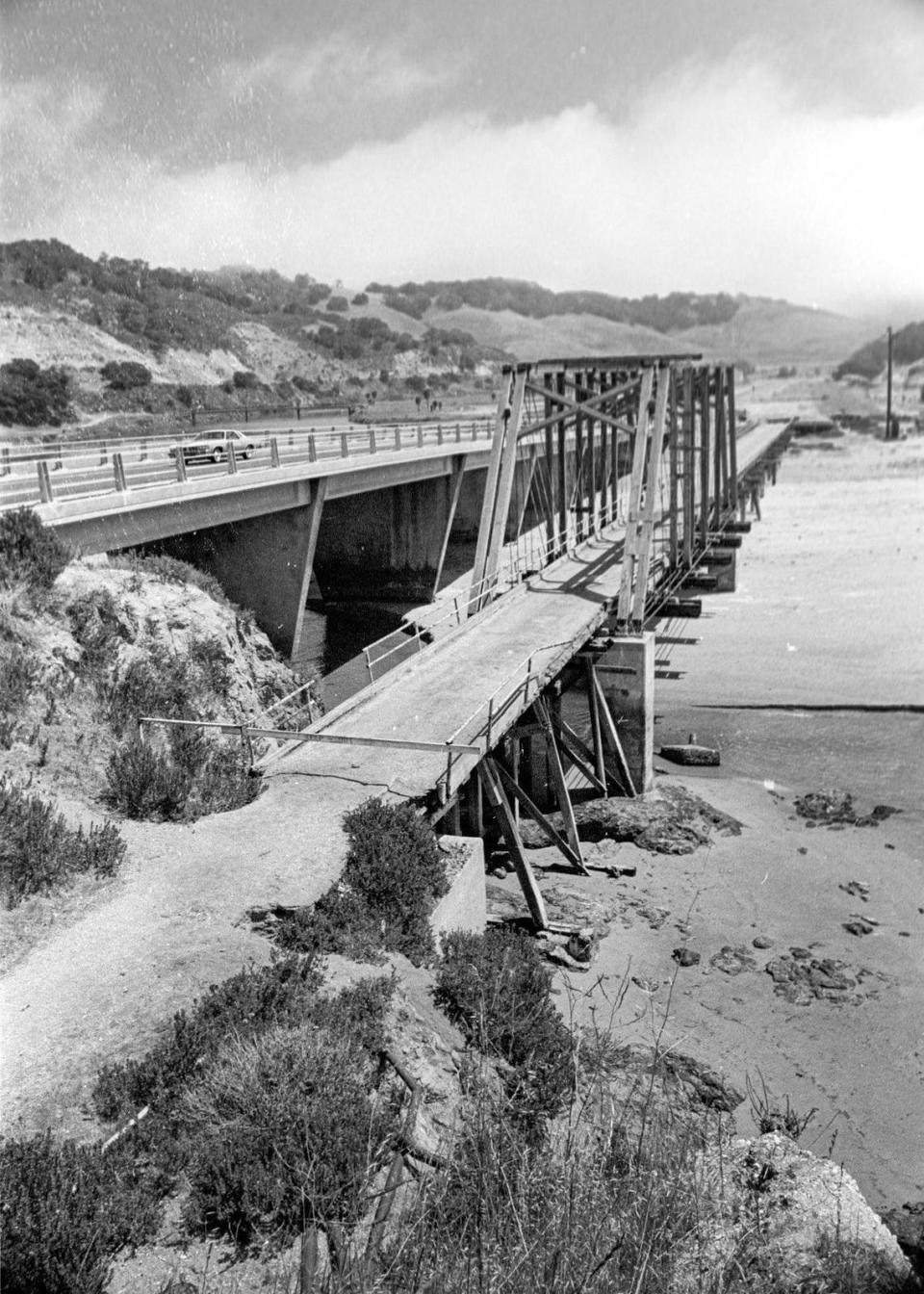 Built in 1881 the Pacific Coast Railway Bridge No. 5 was condemned and closed when it was photographed here June 26,1976. There was a proposal to use it with a bike trail but funding never was found. It collapsed in 1981. Recent storms have exposed the footings for the bridge over San Luis Creek.