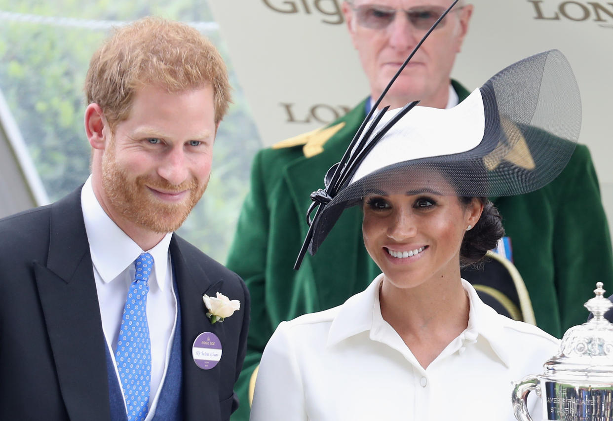 ASCOT, ENGLAND - JUNE 19:  Meghan, Duchess of Sussex and Prince Harry, Duke of Sussex attend the prize ceremony of Royal Ascot Day 1 at Ascot Racecourse on June 19, 2018 in Ascot, United Kingdom.  (Photo by Chris Jackson/Getty Images)