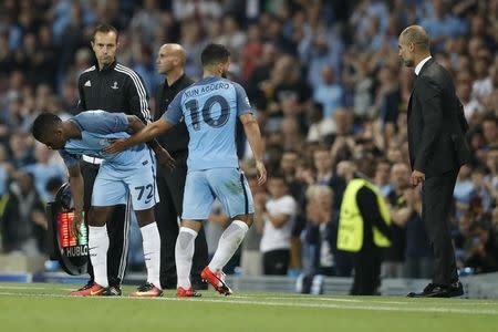 Britain Soccer Football - Manchester City v Borussia Monchengladbach - UEFA Champions League Group Stage - Group C - Etihad Stadium, Manchester, England - 14/9/16 Manchester City's Kelechi Iheanacho comes on as a substitute to replace Sergio Aguero as Manchester City manager Pep Guardiola looks on Action Images via Reuters / Carl Recine Livepic