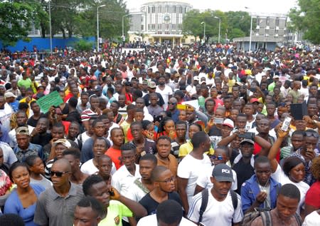 People march during a protest against corruption and economic failure in Monrovia