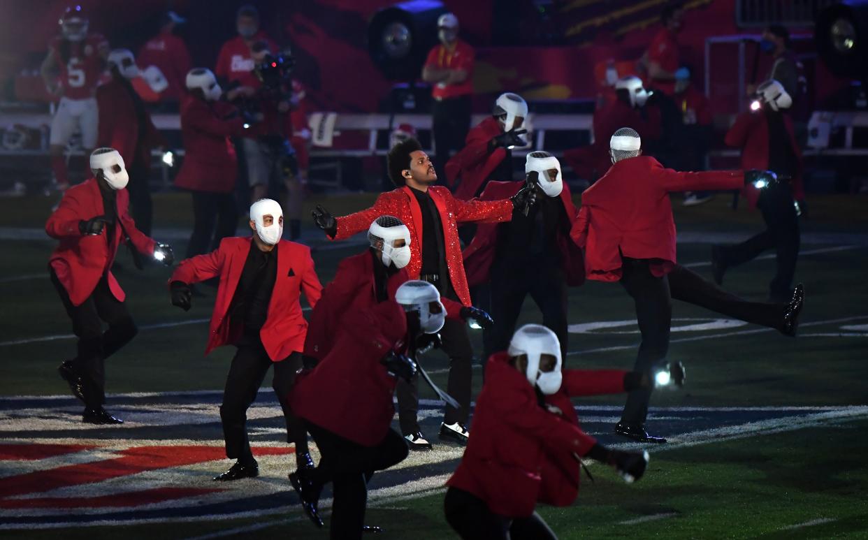 The Weeknd performs among dancers during the 2021 Super Bowl halftime show in Tampa, Florida. (Photo: Kevin Mazur via Getty Images)