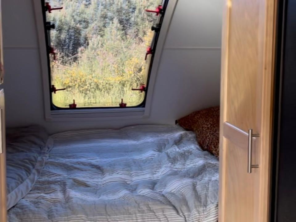 the bed inside of kim kelly stamp's trailer