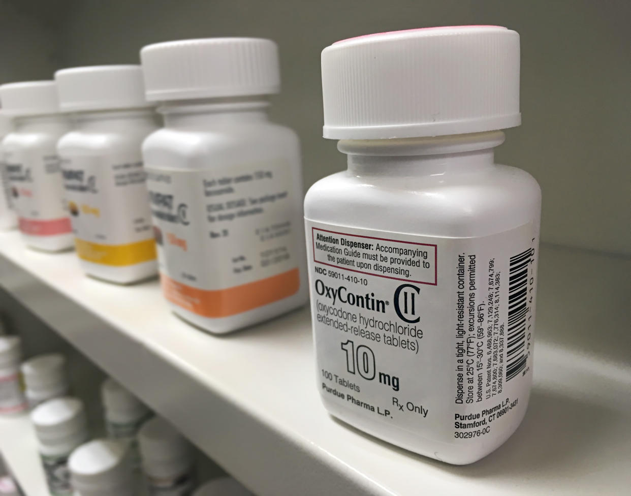 Oxycontin bottle on shelf. Getty Images