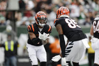 Cincinnati Bengals wide receiver Ja'Marr Chase (1) celebrates with teammate Tee Higgins (85) after scoring a touchdown during the second half of an NFL football game against the New York Jets Sunday, Sept. 25, 2022, in East Rutherford, N.J. (AP Photo/Adam Hunger)